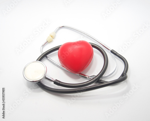Fonendo and rubber heart isolated on white background. Heart health concept