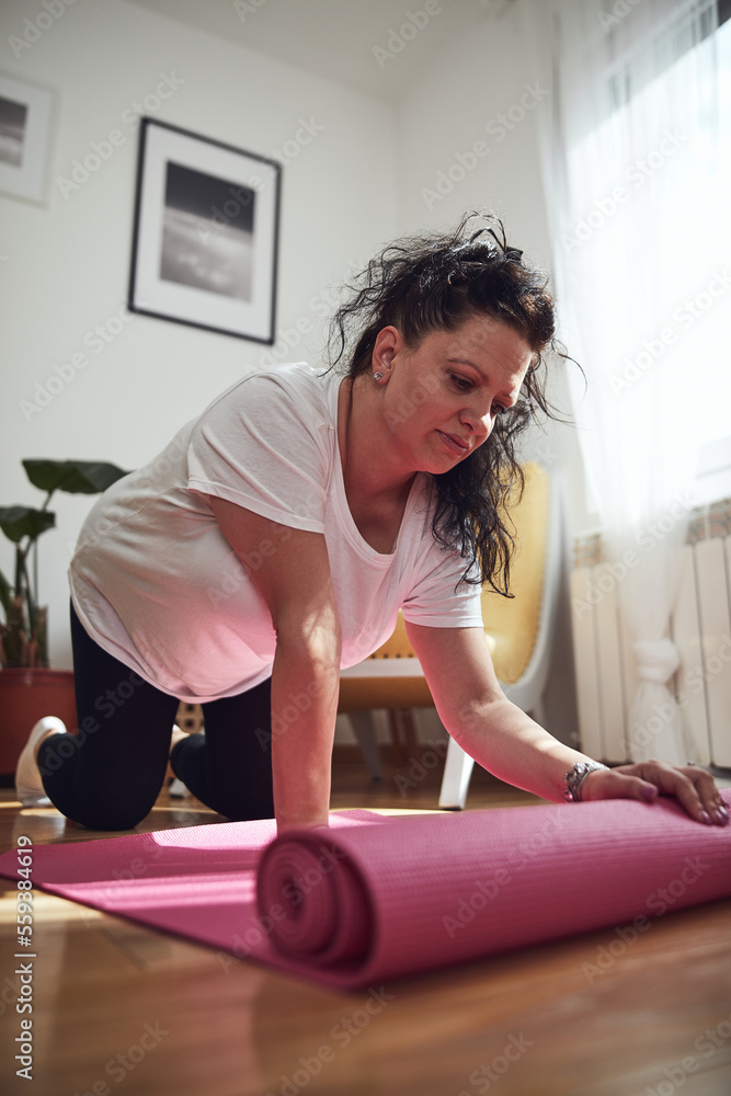 Woman training inside the living room, exercising at home. Woman training inside the living room, exercising at home.