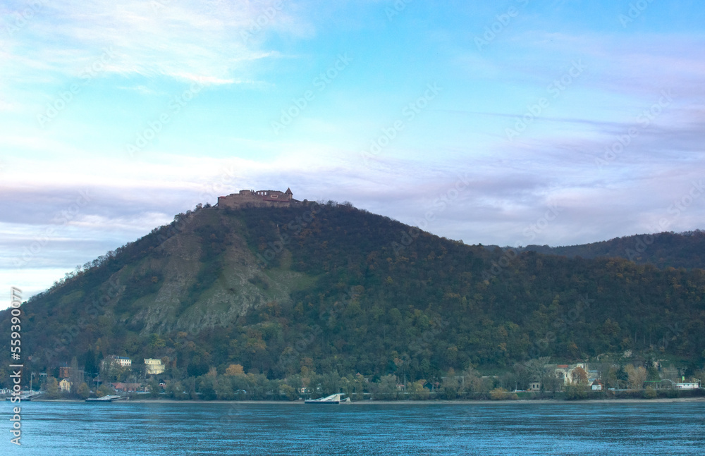 Scenic view witn Visegrad castle on the top of mountain and Danube river in Hungary