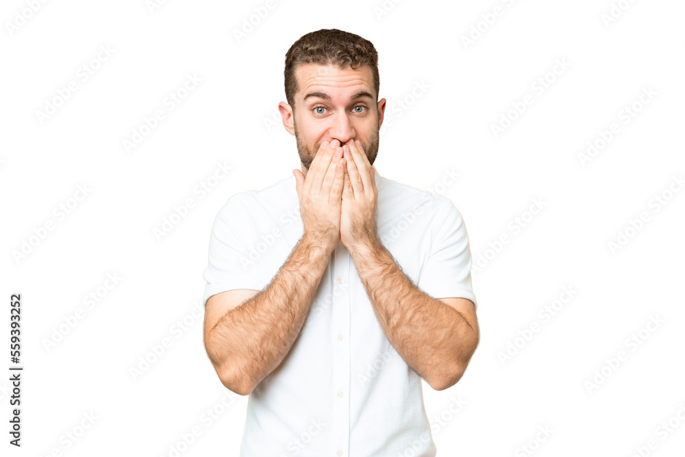 Young handsome blonde man over isolated chroma key background happy and smiling covering mouth with hands Young handsome blonde man over isolated chroma key background happy and smiling covering mouth with hands