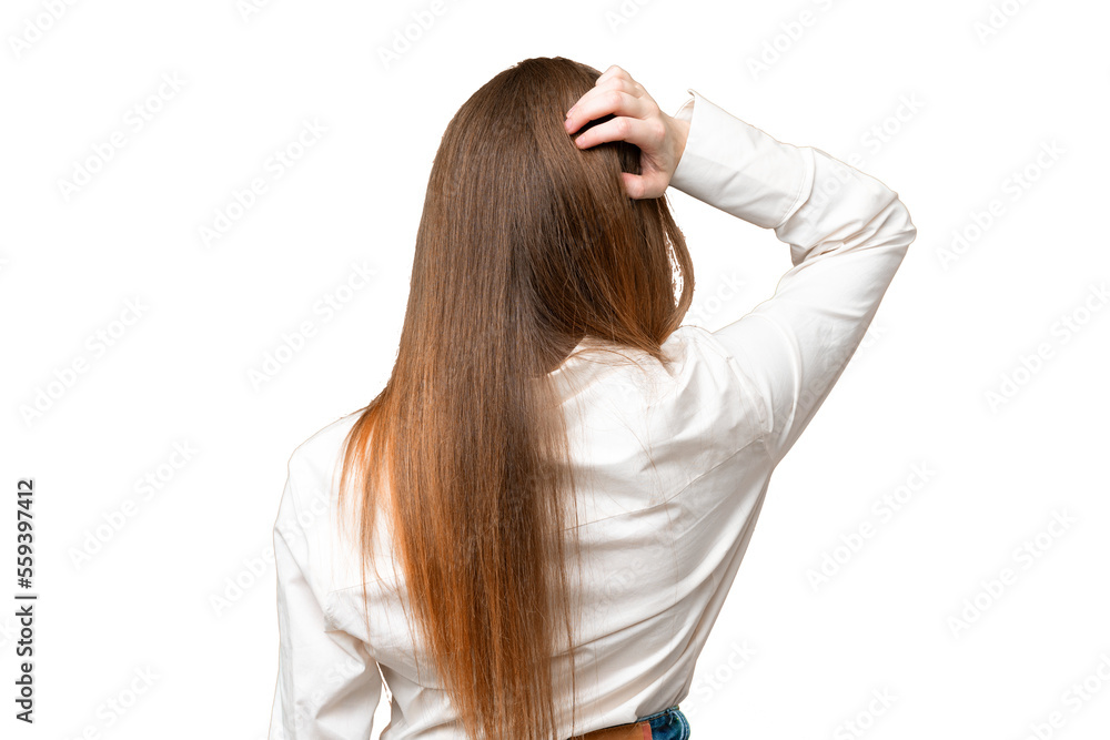 Young pretty woman over isolated chroma key background in back position and thinking Young pretty woman over isolated chroma key background in back position and thinking