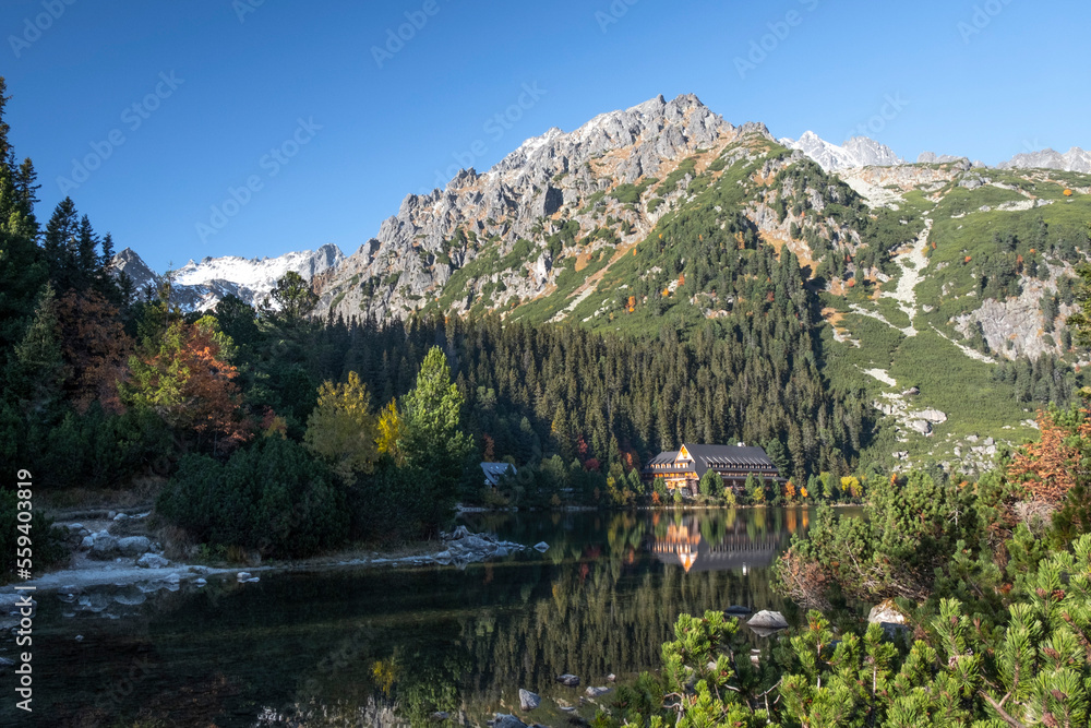 Poprad Lake with autumn forests from the hiking trail in High Tatras National Park, Slovakia