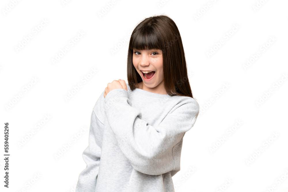 Little girl over isolated green chroma key background celebrating a victory Little girl over isolated green chroma key background celebrating a victory
