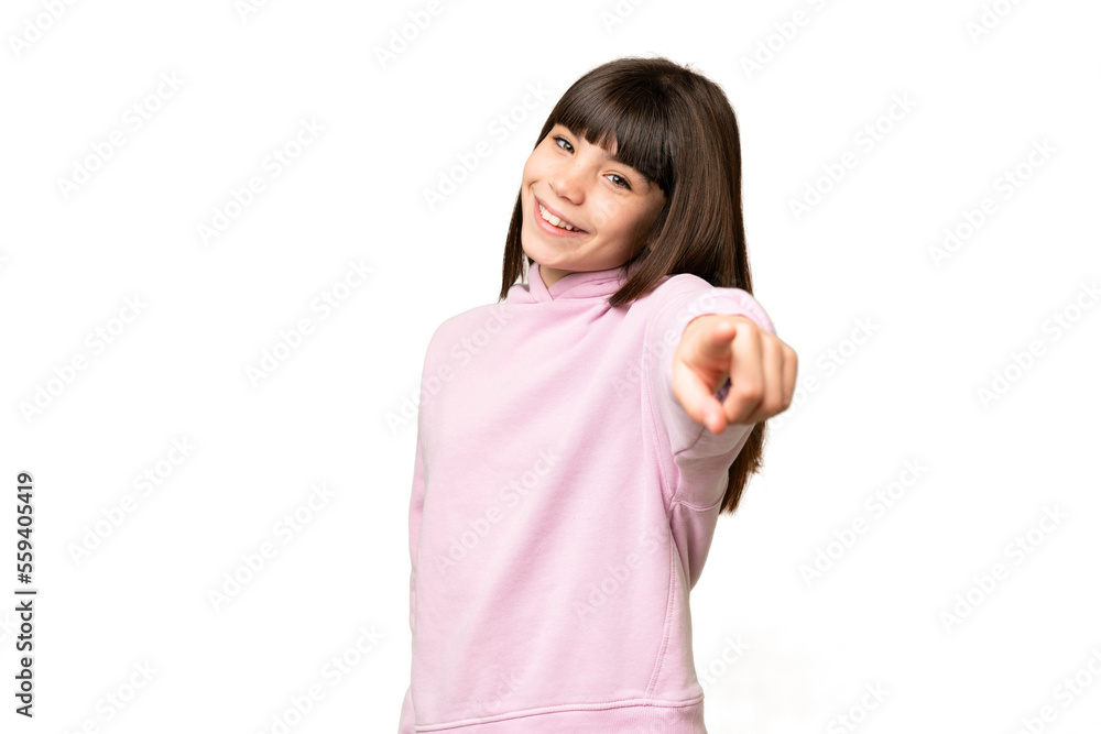 Little girl over isolated green chroma key background pointing front with happy expression Little girl over isolated green chroma key background pointing front with happy expression