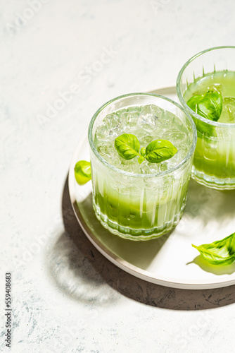Gin, basil and cucumber cocktail drink
