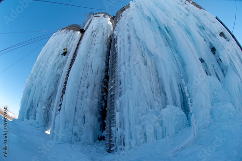 Ice Climbing on farm silos in Iowa photo