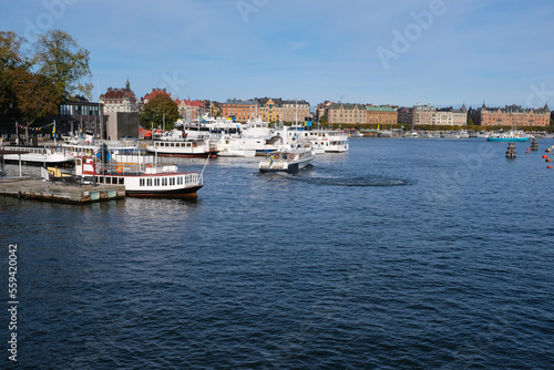 A boat sails in marina in Stockholm, Sweden