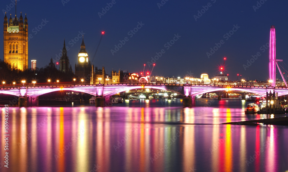 Central London at twilight into night by the River Thames 