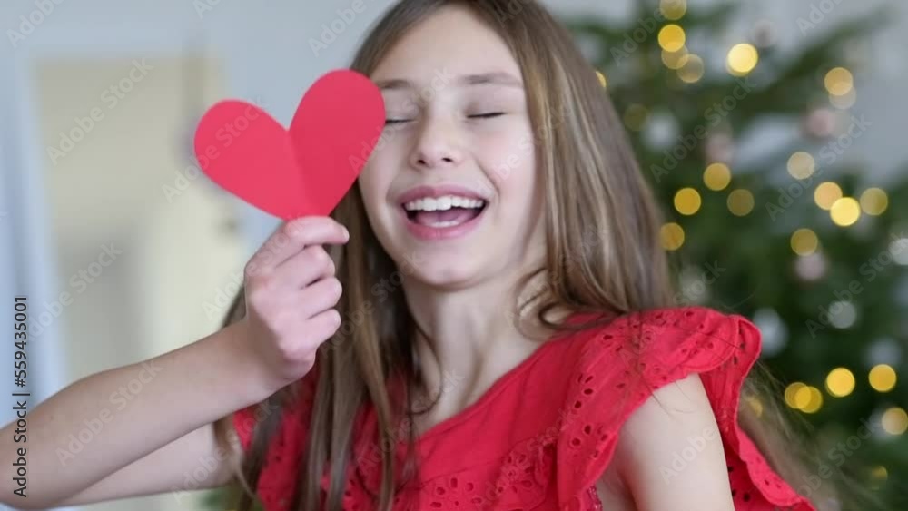 Slow motion video of a girl holding paper hearts, st.Valentines day concept Slow motion video of a girl holding paper hearts, st.Valentines day concept