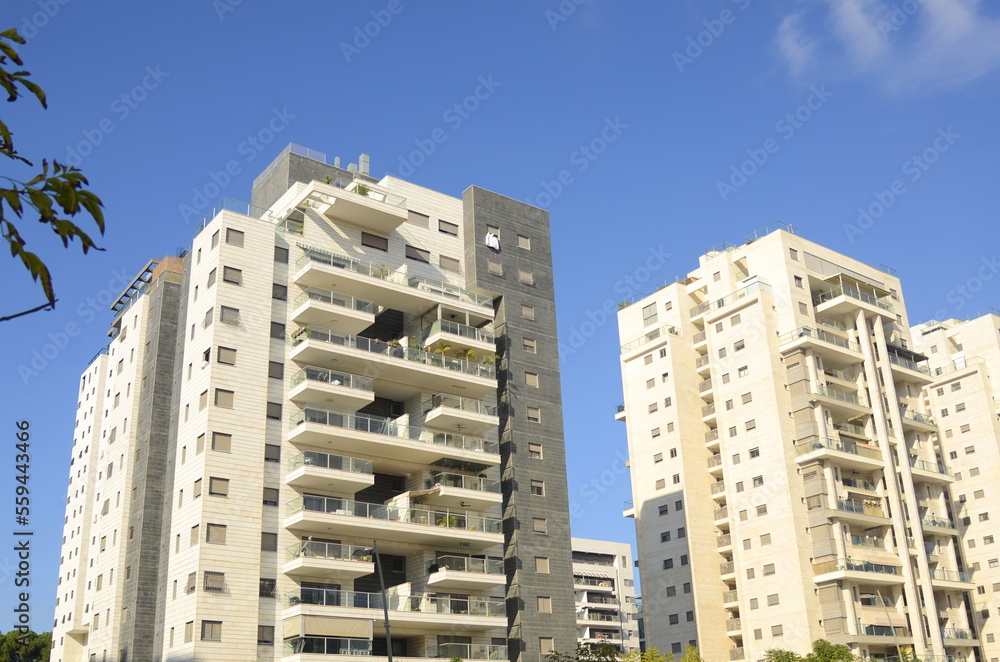 real estate in israel. Beautiful new buildings, apartment buildings. Modern housing. Concept: investment, loan, mortgage, rent, sale real estate in israel. Beautiful new buildings, apartment buildings. Modern housing. Concept: investment, loan, mortgage, rent, sale