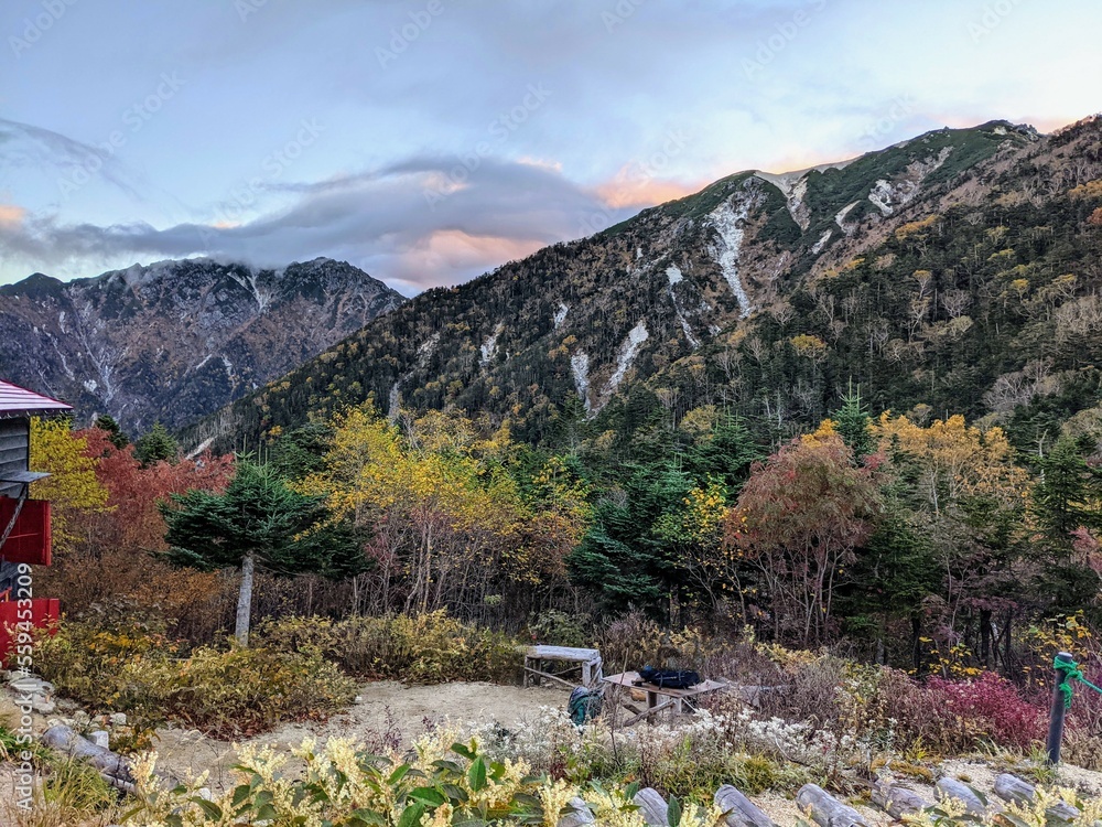 In front of Kosumo Hut in October, colored Mt. Kosumo. Okuwa Village, Nagano Prefecture, Japan In front of Kosumo Hut in October, colored Mt. Kosumo. Okuwa Village, Nagano Prefecture, Japan