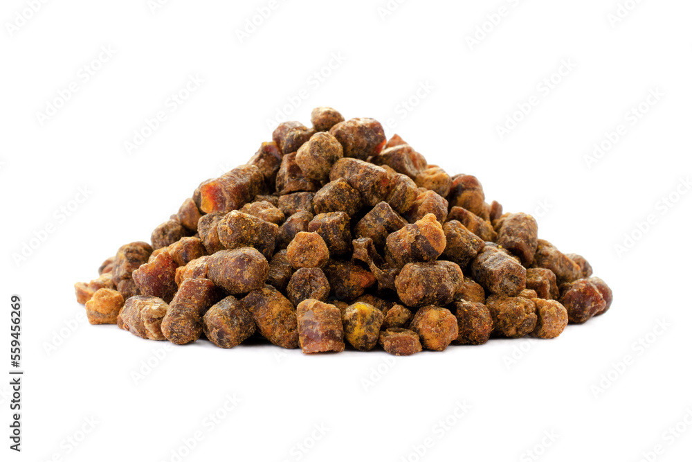 Heap of bee pollen, bee pollen granules isolated on white background. Product of beekeeping. Bee pollen, perga isolated on white background. Perga is a natural remedy for strengthening immunity. Heap of bee pollen, bee pollen granules isolated on white background. Product of beekeeping. Bee pollen, perga isolated on white background. Perga is a natural remedy for strengthening immunity.