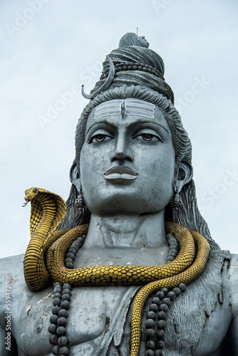 A view of the Shiva temple on the banks of Arabian sea in the town of Muradeshwara photo