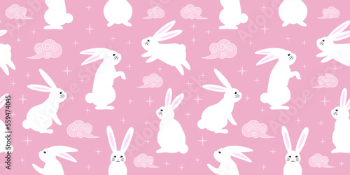 Seamless pattern with zodiacal rabbits in the sky, seamless pattern for Chinese New Year, 2023 Year of the Rabbit, pattern for gifts covers, backgrounds, invitations.