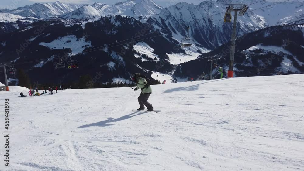 snowboarder. girl snowboarding. man is snowboarding in Zillertal snowboarder. girl snowboarding. man is snowboarding in Zillertal