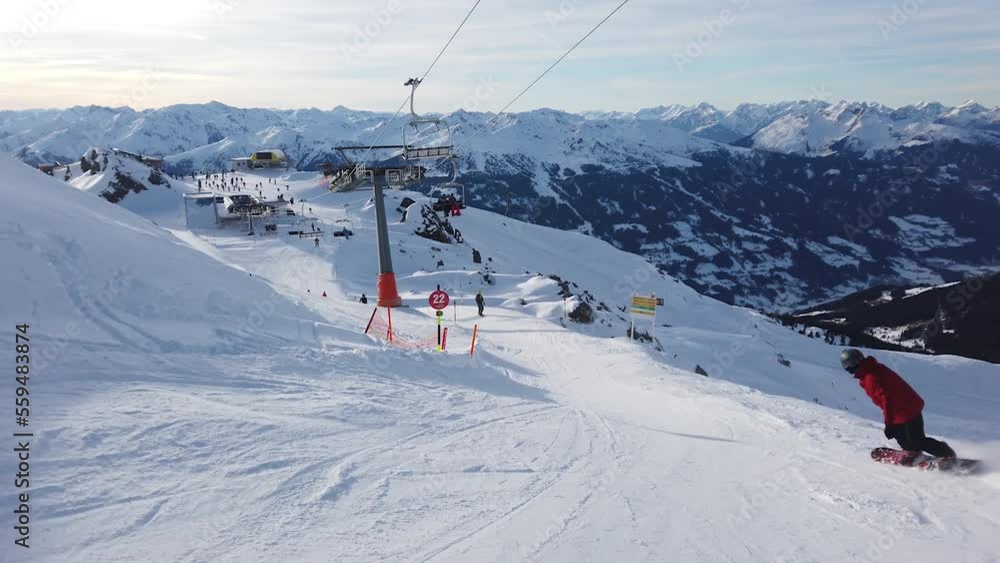 snowboarder. girl snowboarding. man is snowboarding in Zillertal snowboarder. girl snowboarding. man is snowboarding in Zillertal