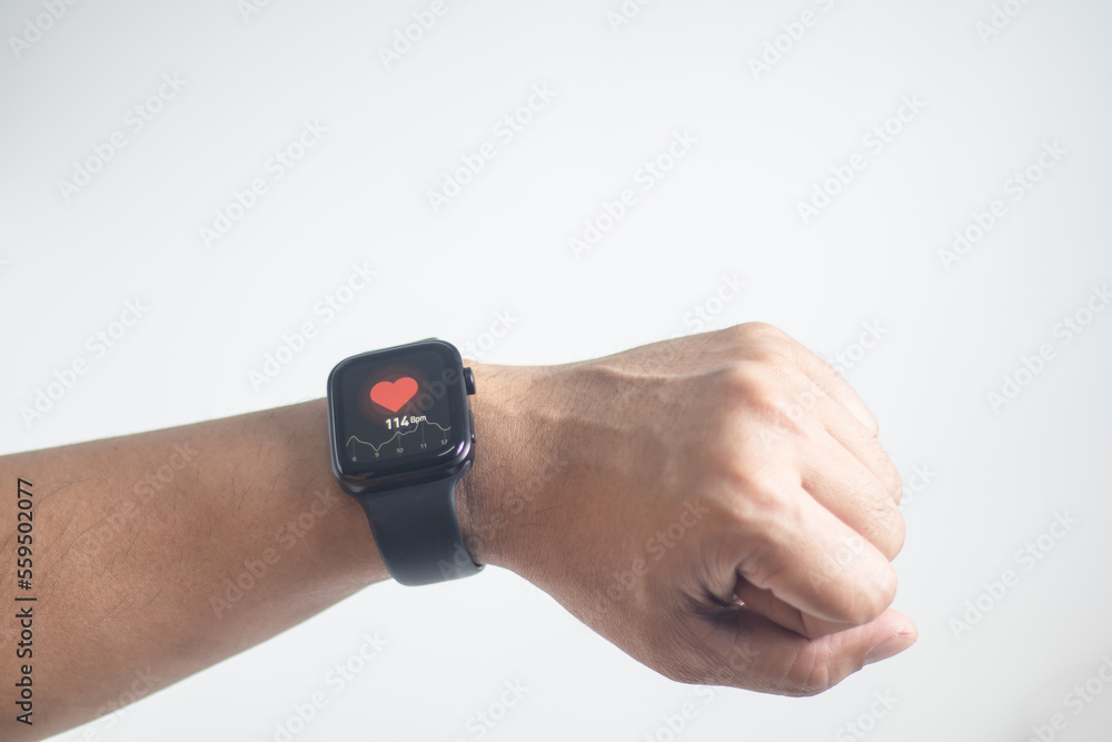 Men wear heart rate watches, health care concepts and technologies. Men wear heart rate watches, health care concepts and technologies.
