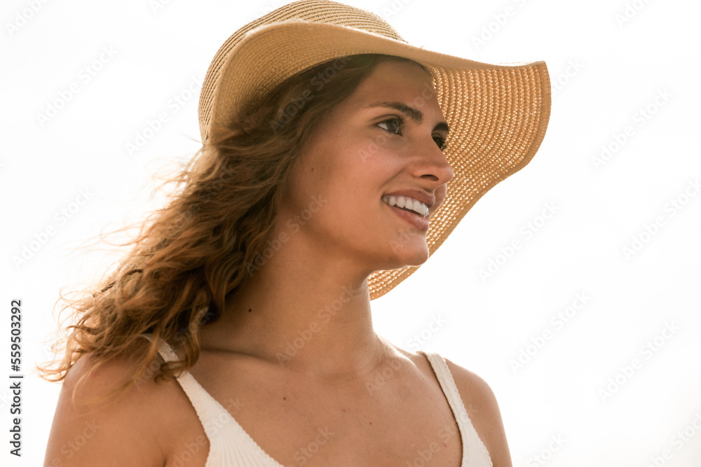 Portrait of a beauty woman in hat outdoors in summer Portrait of a beauty woman in hat outdoors in summer