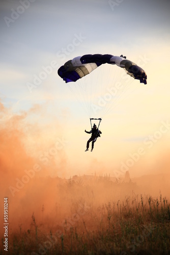 parachute landing through smoke
