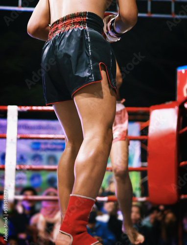 Muay Thai fighting on the boxing ring