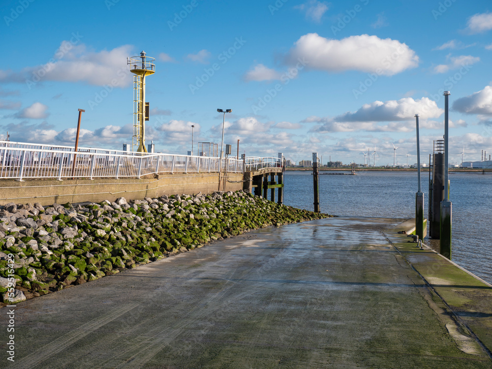 The new quay for launching pleasure boats in the small harbor of the polder village of Doel in Belgium