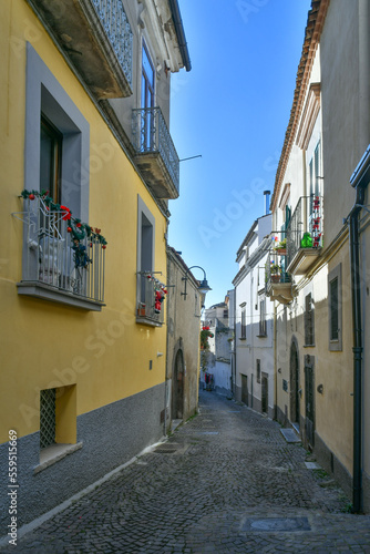 A narrow street among the old houses of Melfi  a village in the province of Potenza in Italy.