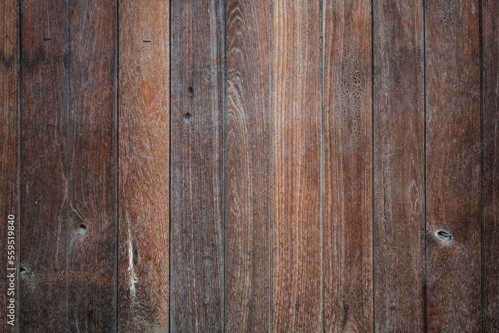 Textured background of wooden deck with dark brown board Textured background of wooden deck with dark brown board