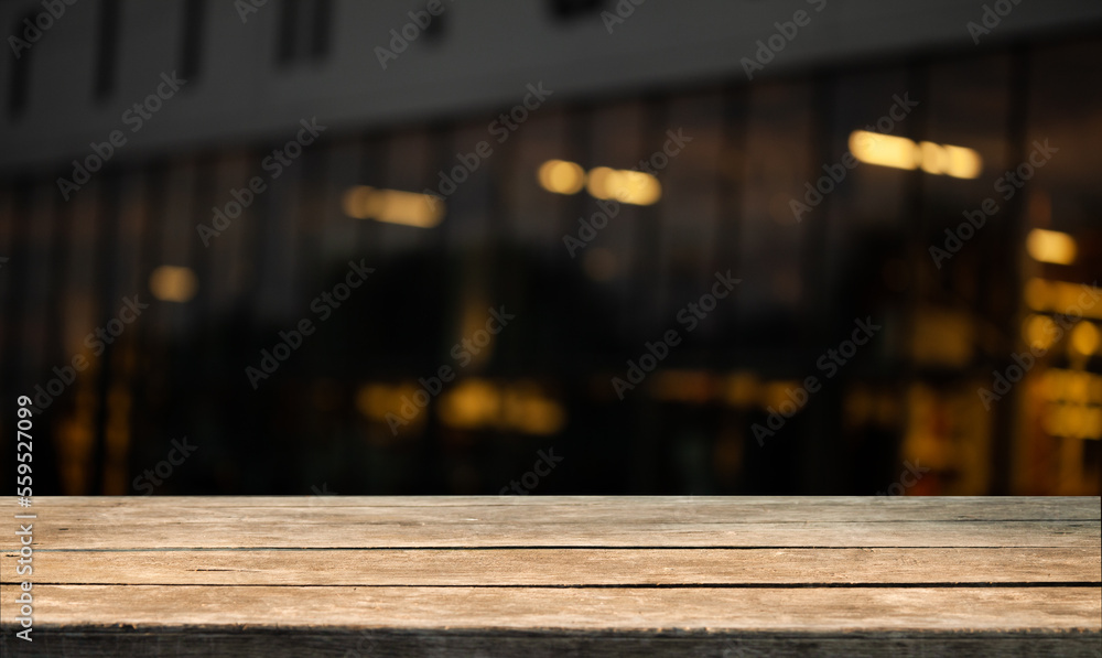 dark blurred background with empty table top, cafe restaurant windows. background for your product dark blurred background with empty table top, cafe restaurant windows. background for your product