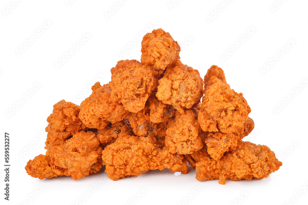 Heap of fried spicy chicken isolated on white background. Heap of fried spicy chicken isolated on white background.