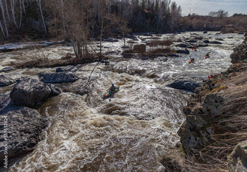 Wallpaper Mural Water sports competitions on kayaks on a full-flowing river in spring Torontodigital.ca