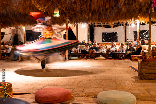 speed rotational dance in the egyptian night photo