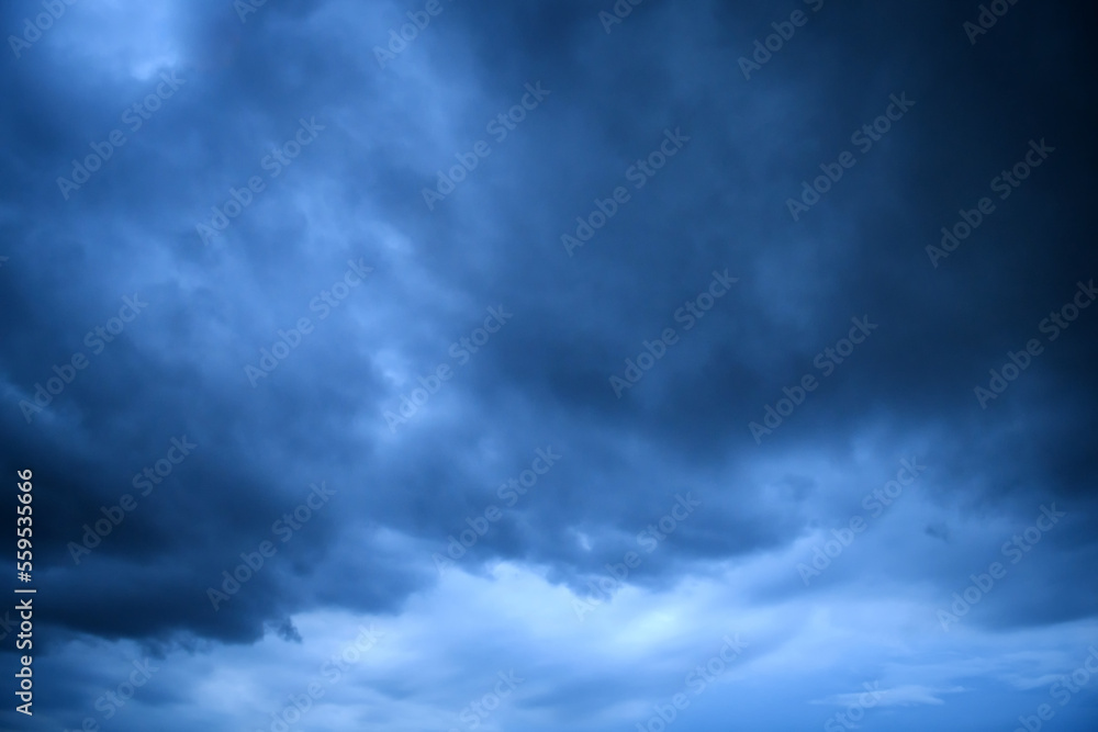 Storm clouds floating in a rainy day with natural light. Cloudscape scenery, overcast weather above blue sky. White and grey clouds scenic nature environment background Storm clouds floating in a rainy day with natural light. Cloudscape scenery, overcast weather above blue sky. White and grey clouds scenic nature environment background