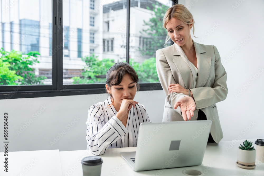Businesswoman working at the company talking to colleagues, teamwork. Businesswoman working at the company talking to colleagues, teamwork.