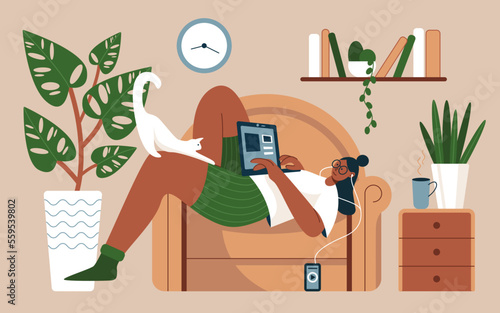 Girl lying in home armchair with laptop vector illustration. Cartoon happy young woman listening to music with headphones, working or studying online on couch with cat in living room interior
