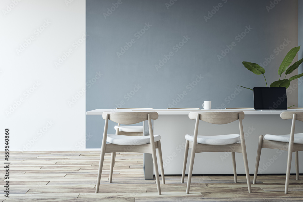 Front view on big white table with modern laptop and light chairs around on wooden floor and grey wall background. 3D rendering