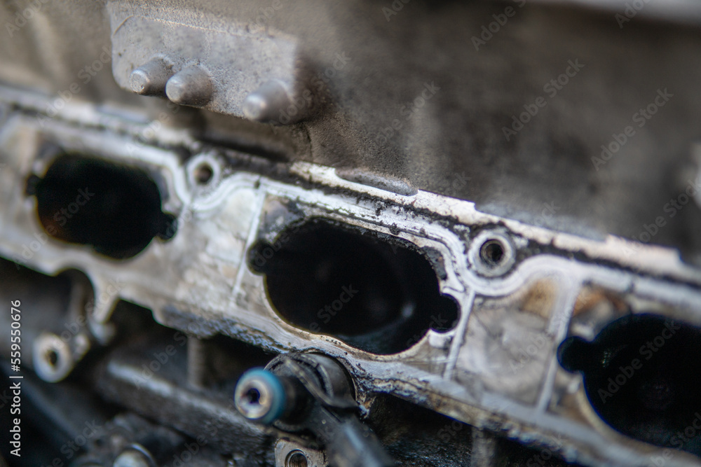 car engine Dirty intake manifold. Close up of dirty intake manifold ports. Engine cleaning
