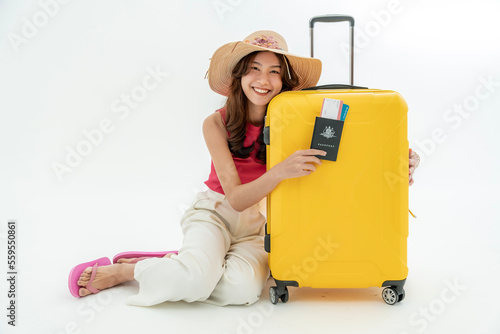 Photographs of Asian women with their suitcases with passports and travel tickets. isolated on a white background