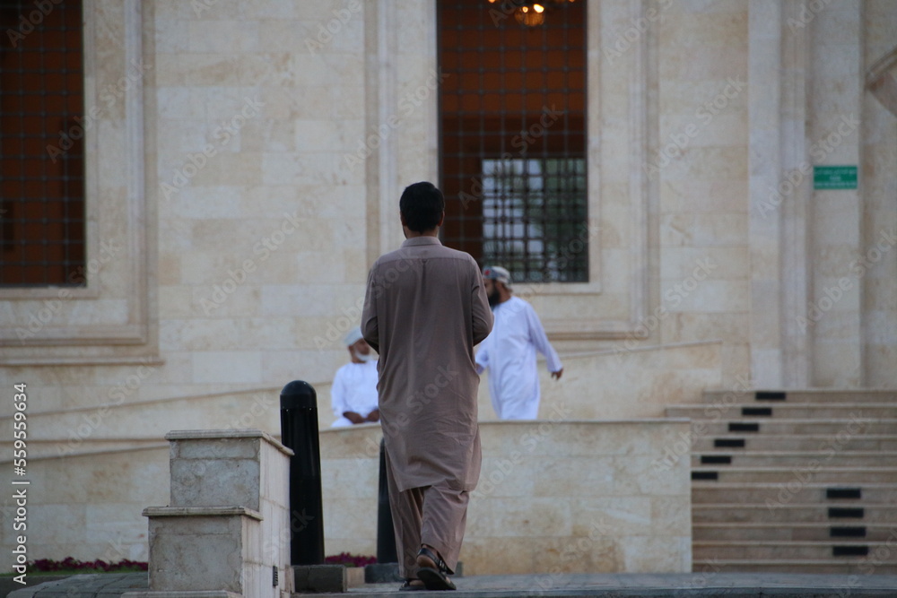 Man outside a mosque (Muscat, Oman)