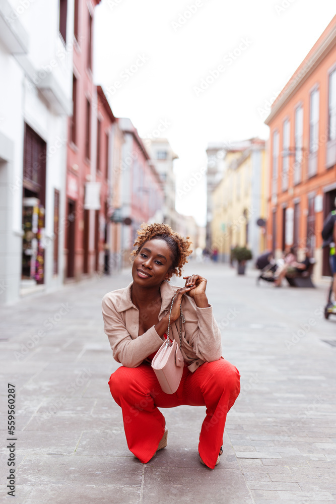 Naklejka premium Young tourist in streets of city of La Laguna in Tenerife Spain