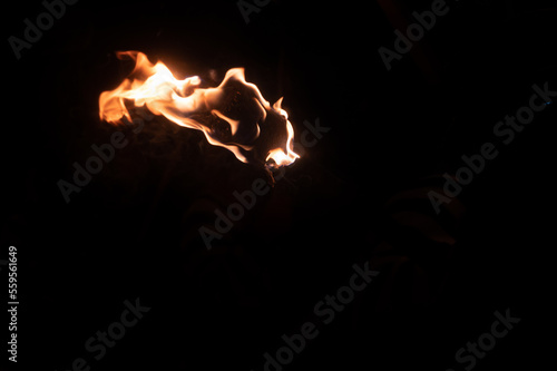 Fire and burning torches at bonfire celebration, 5th November 2022, Lewes, Sussex