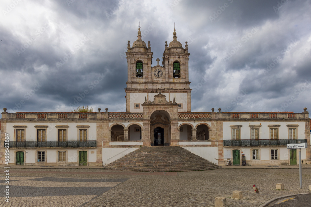 Sanctuary of Our Lady of Nazaré, Portugal with dramatic skies in the background