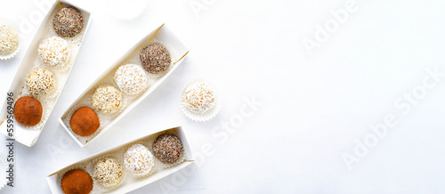 Assorted vegan sweets, Delicious Candy Balls with seeds, dried fruit and cocoa powder, Healthy Candies