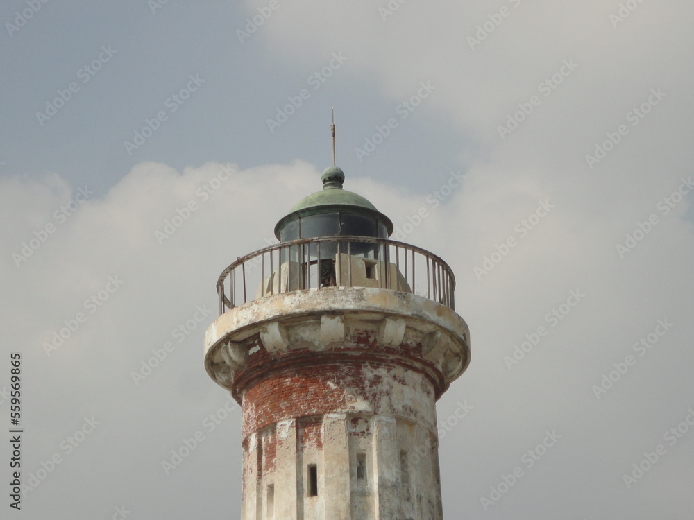 Old Lighthouse of a city with broken bricks Old Lighthouse of a city with broken bricks