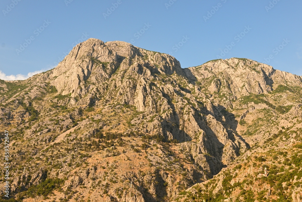 Mountain peaks over Bay of Kotor during sunset. Kotor city. Montenegro