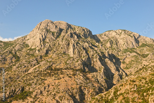 Mountain peaks over Bay of Kotor during sunset. Kotor city. Montenegro