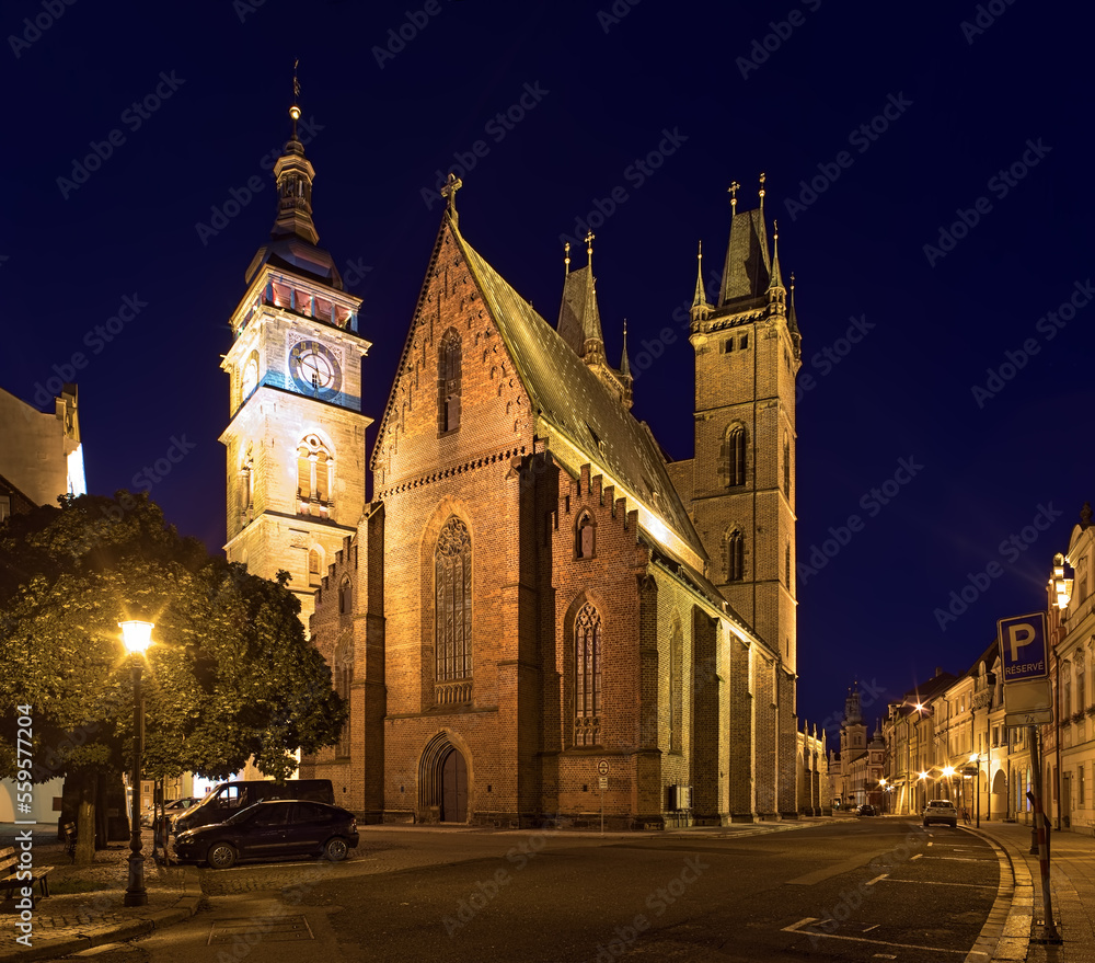 Hradec Kralove, Czech Republic. Cathedral of the Holy Spirit and White Tower in dusk. The cathedral was founded in 1307. The tower was founded in 1574.