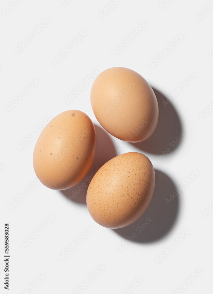 Chicken eggs on a white isolated background Chicken eggs on a white isolated background