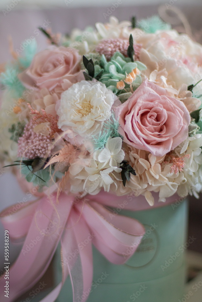 Preserved flower arrangement. Flower box Roses, Hydrangea, Peony Rose in tiffany colors. Flowers for girl, for mother's day, valentine's day, Woman's day 8 march. Preserved flower arrangement. Flower box Roses, Hydrangea, Peony Rose in tiffany colors. Flowers for girl, for mother's day, valentine's day, Woman's day 8 march.