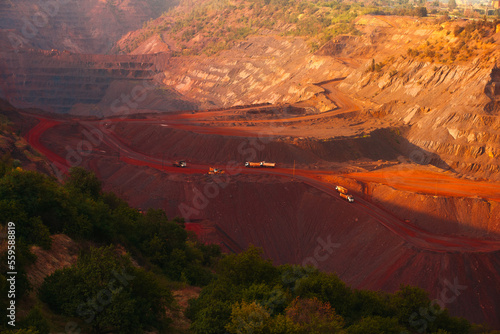 Iron ore quarry landscape with transport