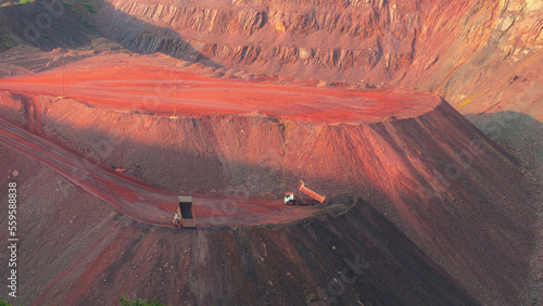 Iron ore quarry landscape with transport